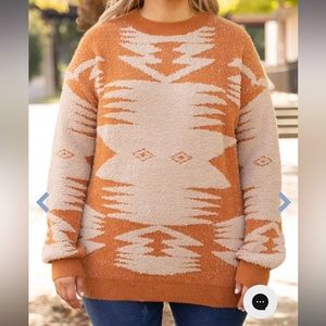 Grey sweater. Aztec design